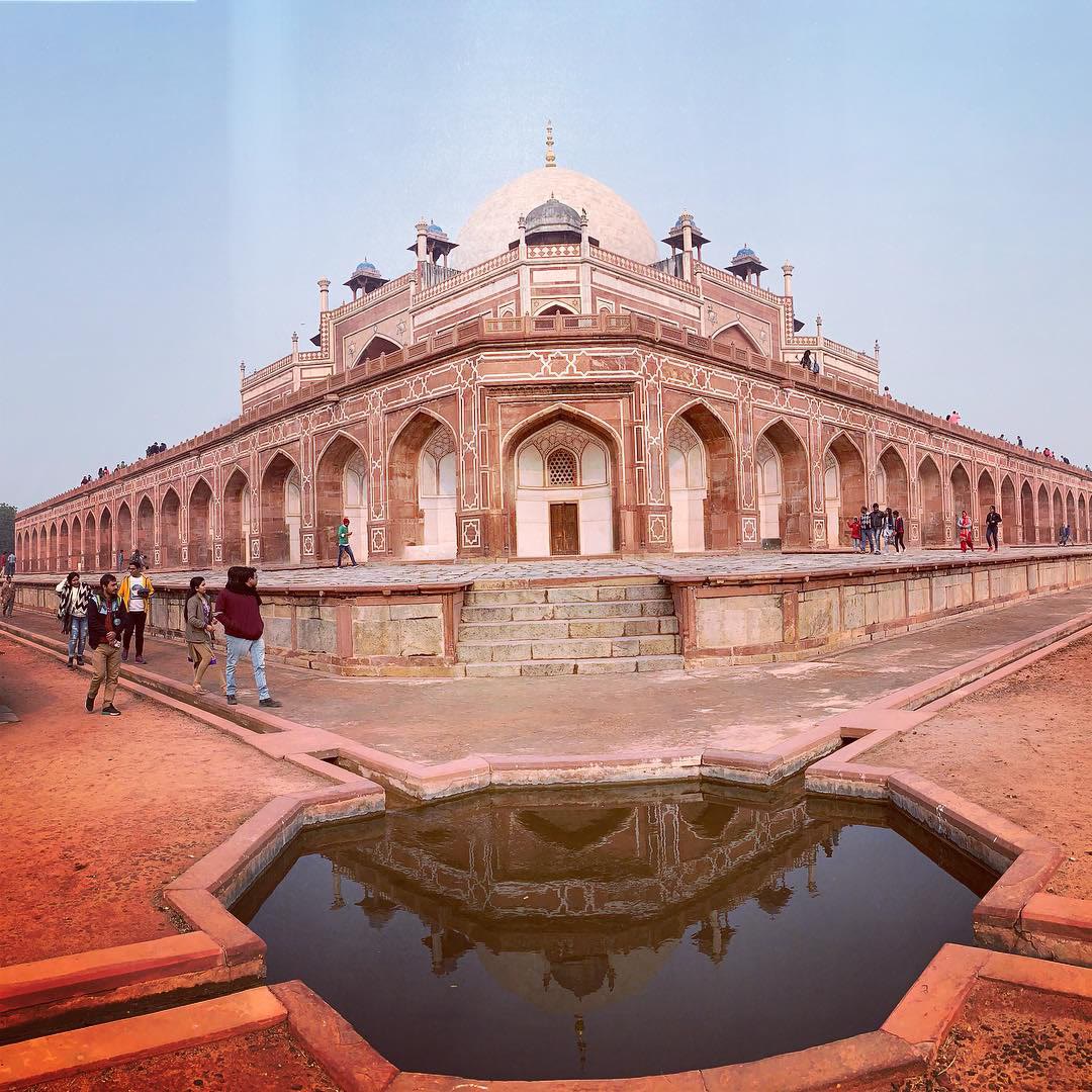 Humayun's Tomb in Delhi reflected in a star-shaped pool in its gardens
