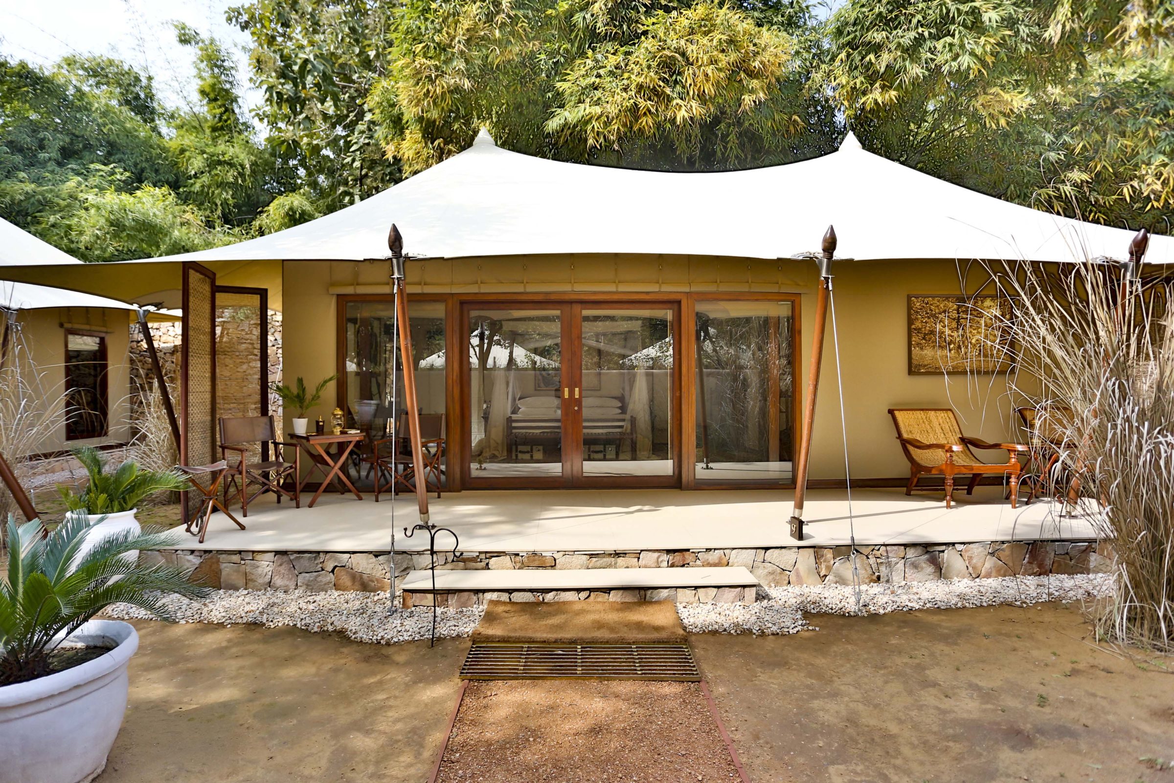 A tent at Sujan Jawai with a veranda and glass doors