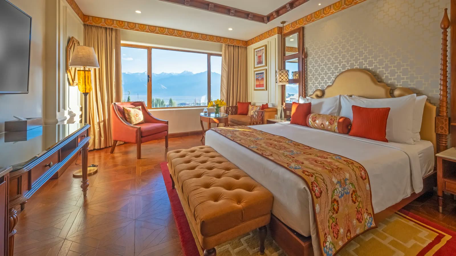 Bedroom with mountain views at The Grand Dragon Ladakh