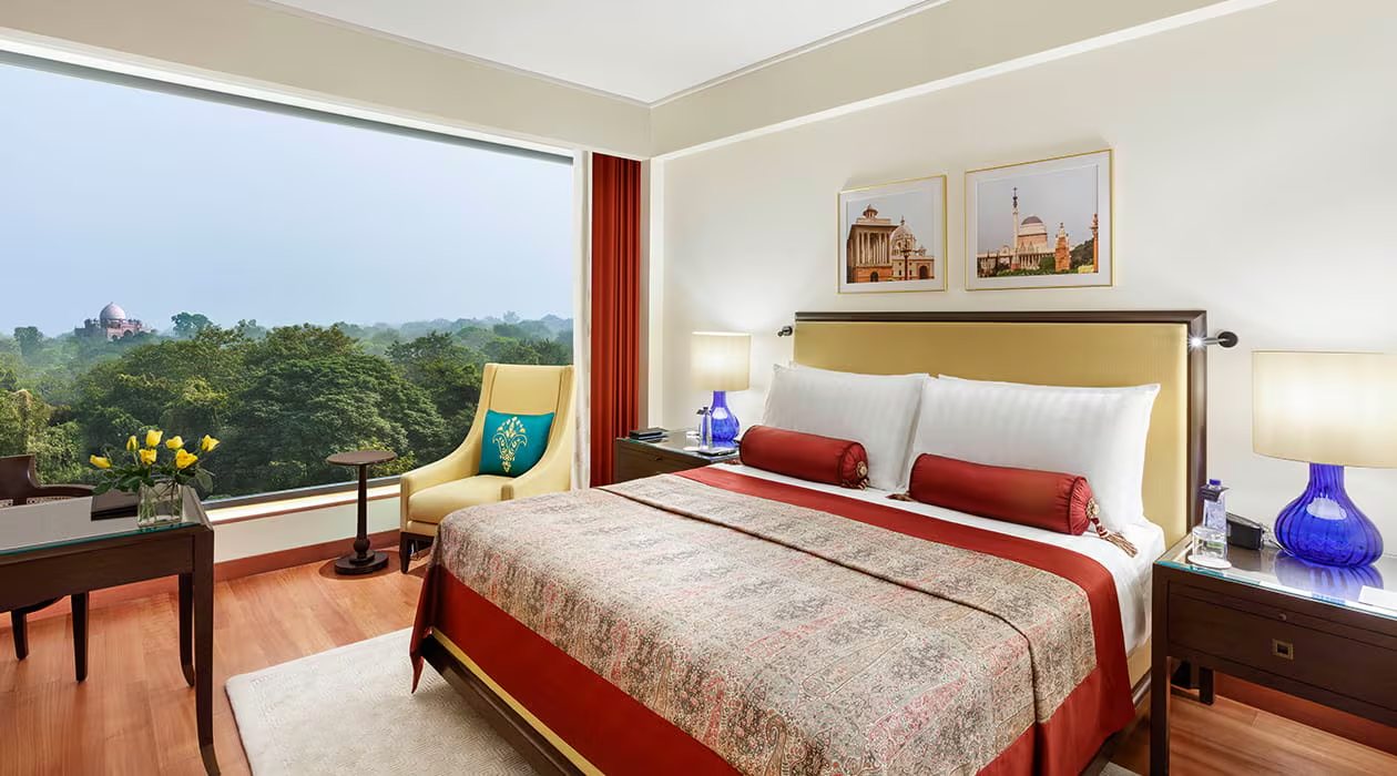 A luxury room at The Oberoi, New Delhi, looking out over the trees