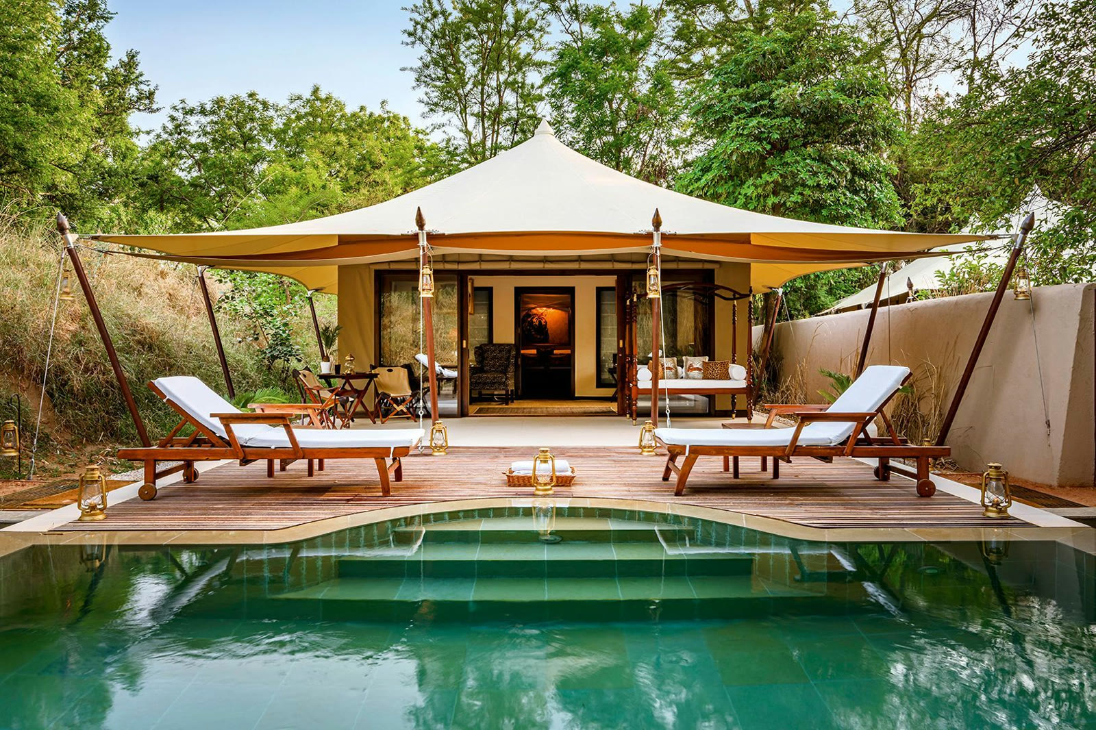 Tented suite at Sujan Sher Bagh, with a private pool and loungers on the deck